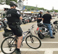 Police officer on bicycle at Laconia Motorcycle week